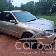 MAZDA 323 2000