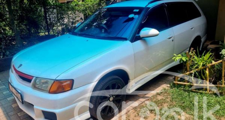 NISSAN WINGROAD Y11 2002