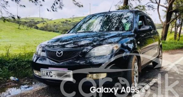 MAZDA DEMIO 2003