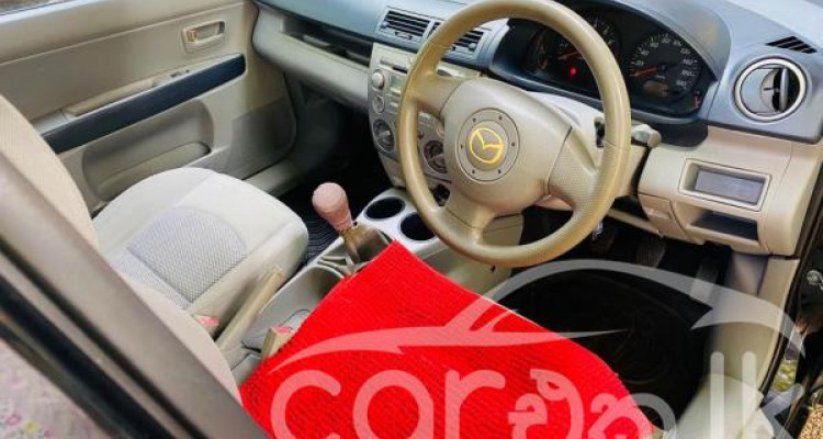 MAZDA DEMIO 2003