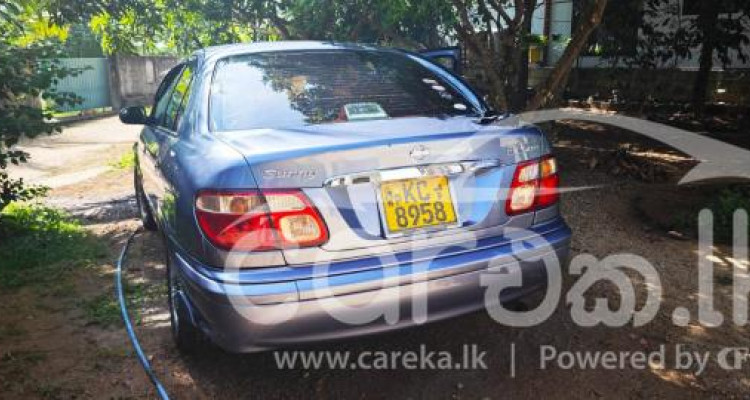 NISSAN EX SALOON 2002