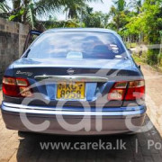 NISSAN EX SALOON 2002