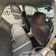 MAZDA 323 2002