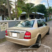 MAZDA 323 2002
