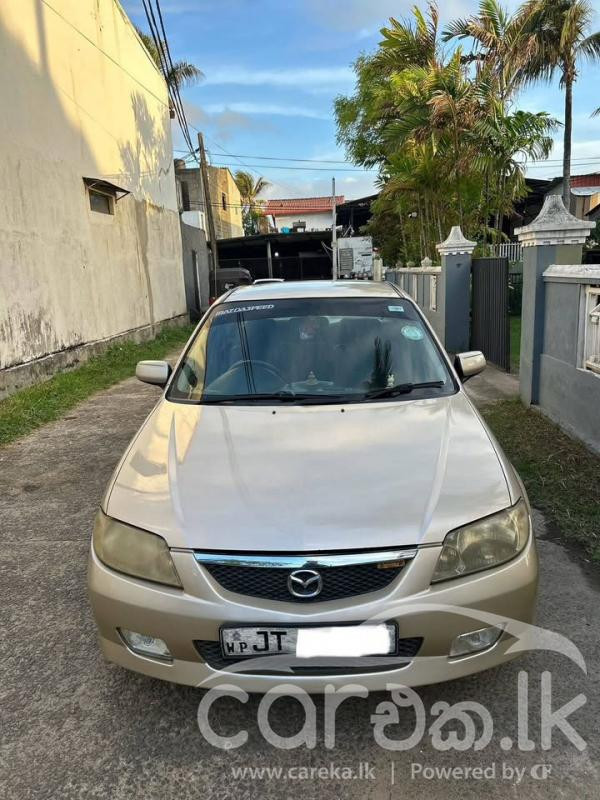 MAZDA 323 2002