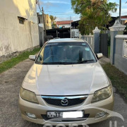 MAZDA 323 2002